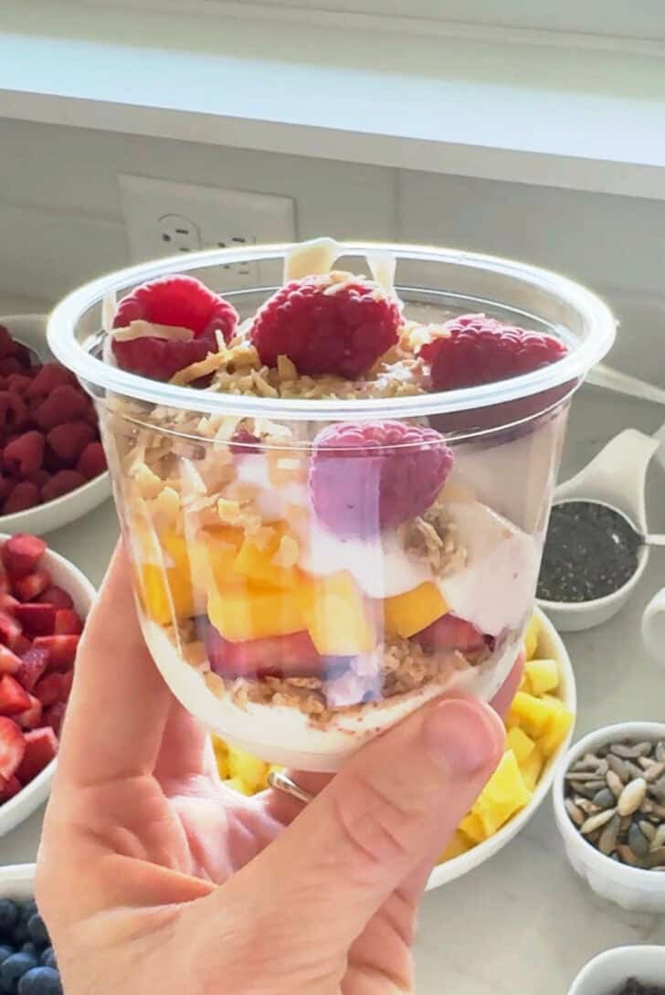 Clear cup with build-your-own yogurt parfait.