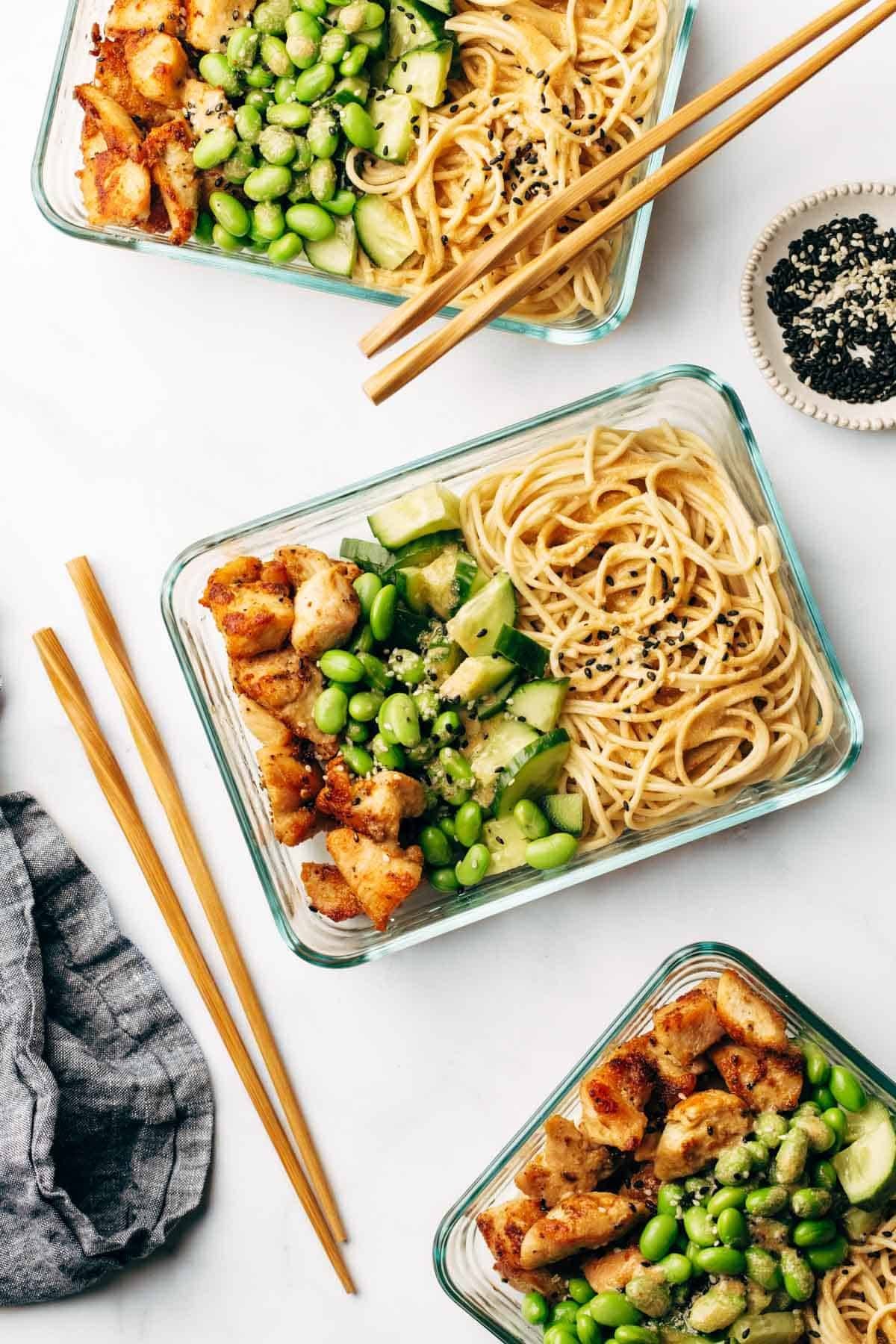 Sesame noodle bowls in containers.