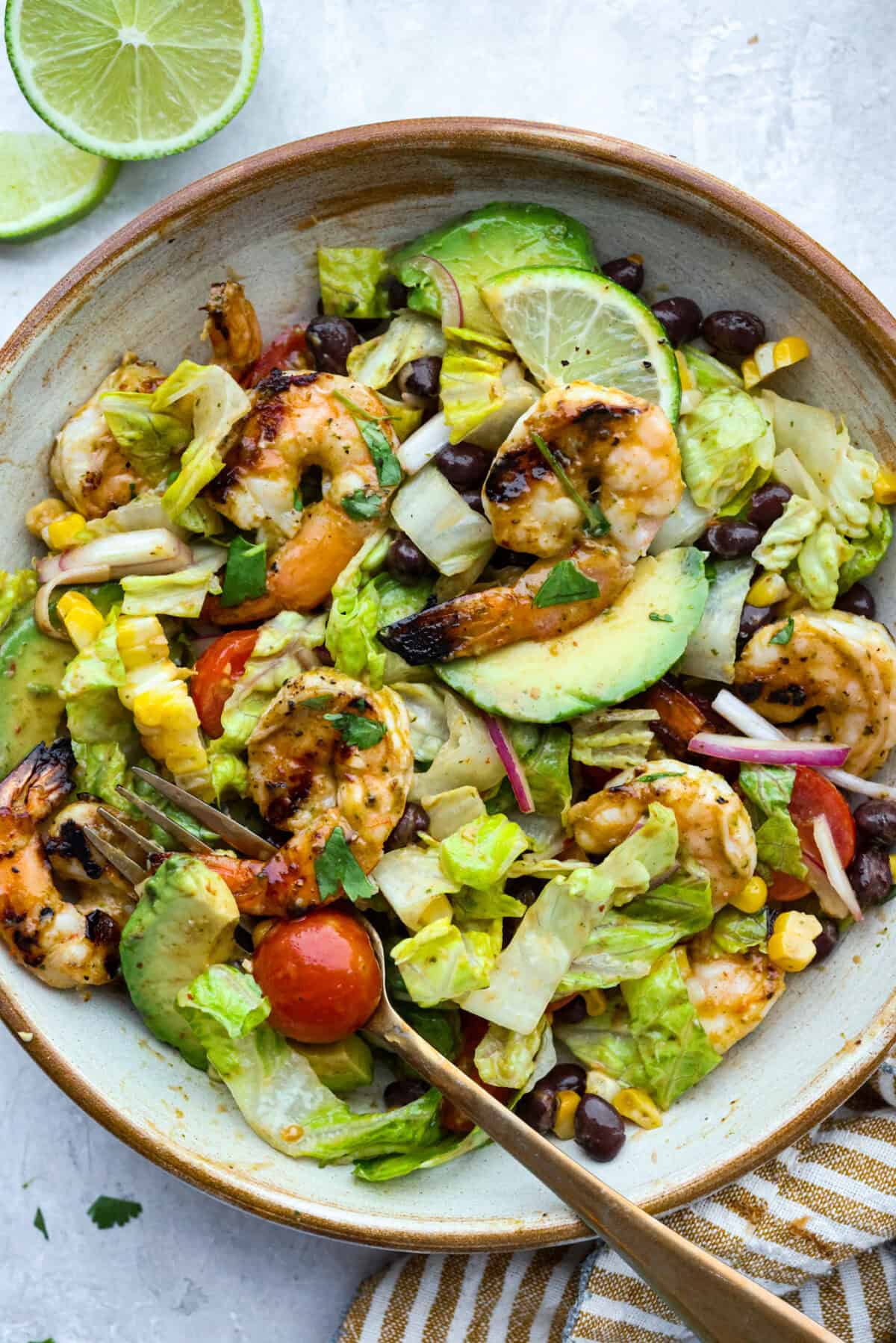 Serving bowl of grilled shrimp salad. 