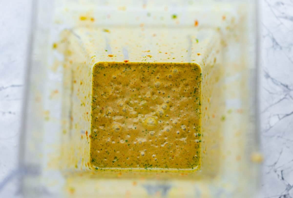 Dressing ingredients blended together in a blender. 