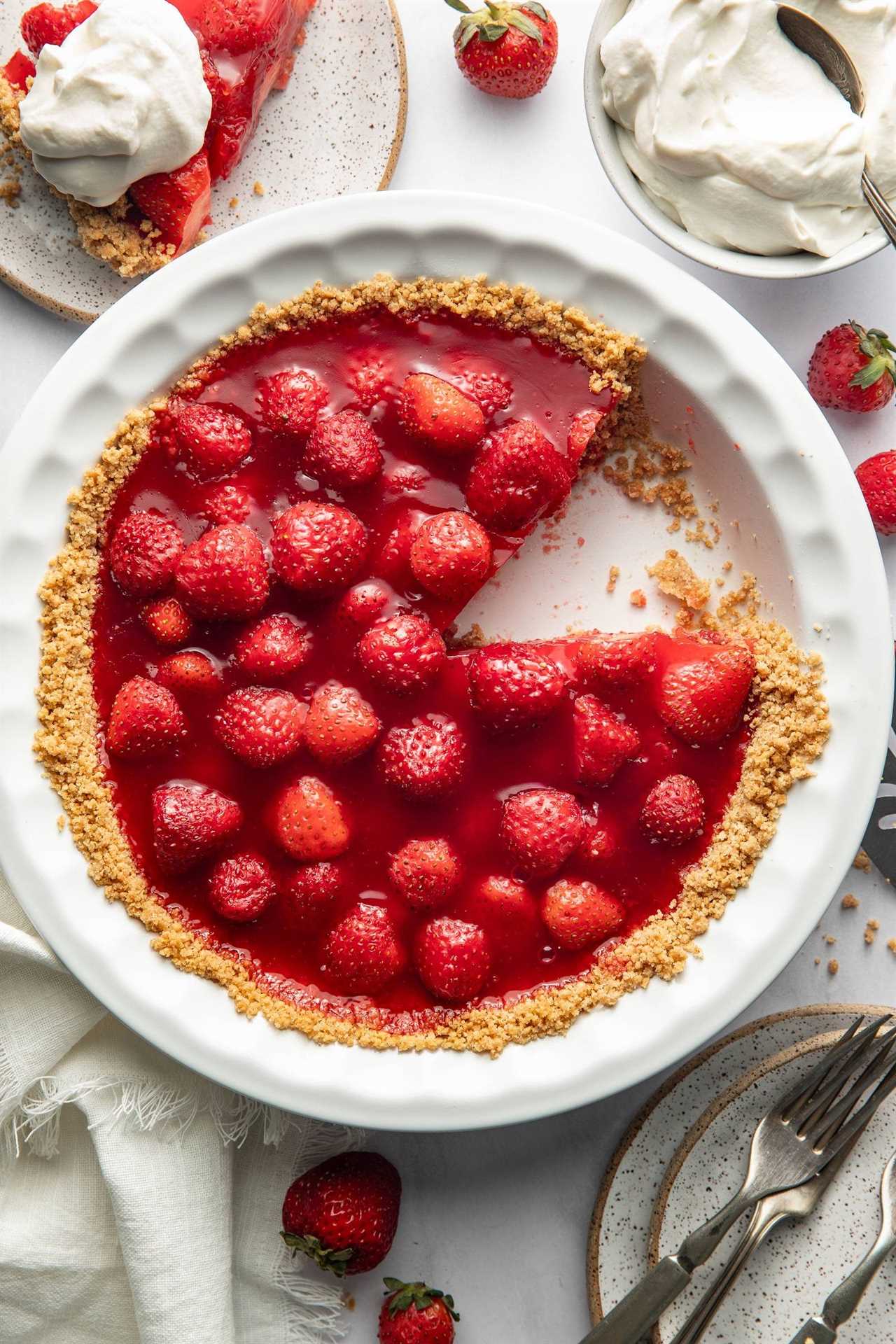 Strawberry pie with slice.