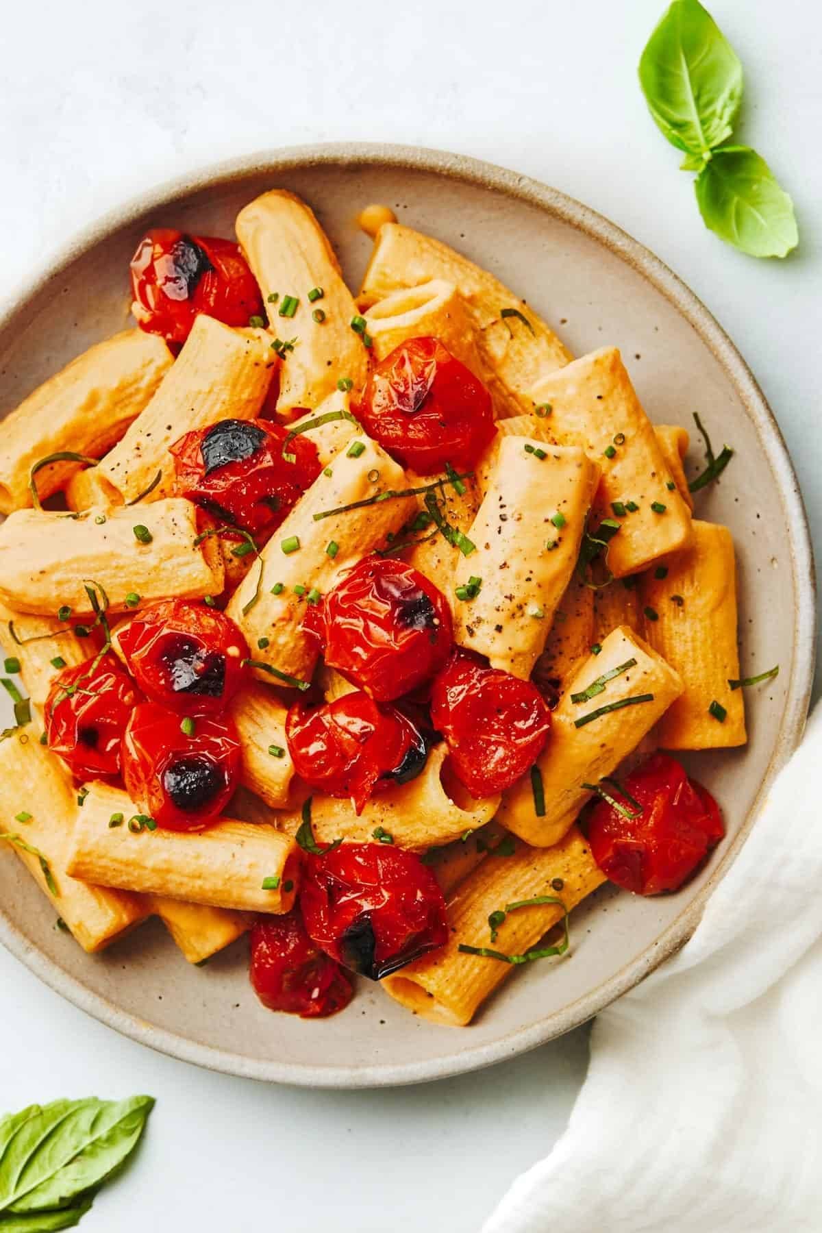 Red pepper pasta with tomatoes.