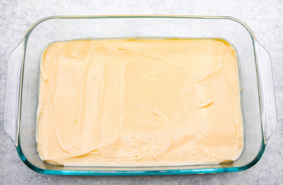 Cheesecake layer over he top of the graham cracker layer.