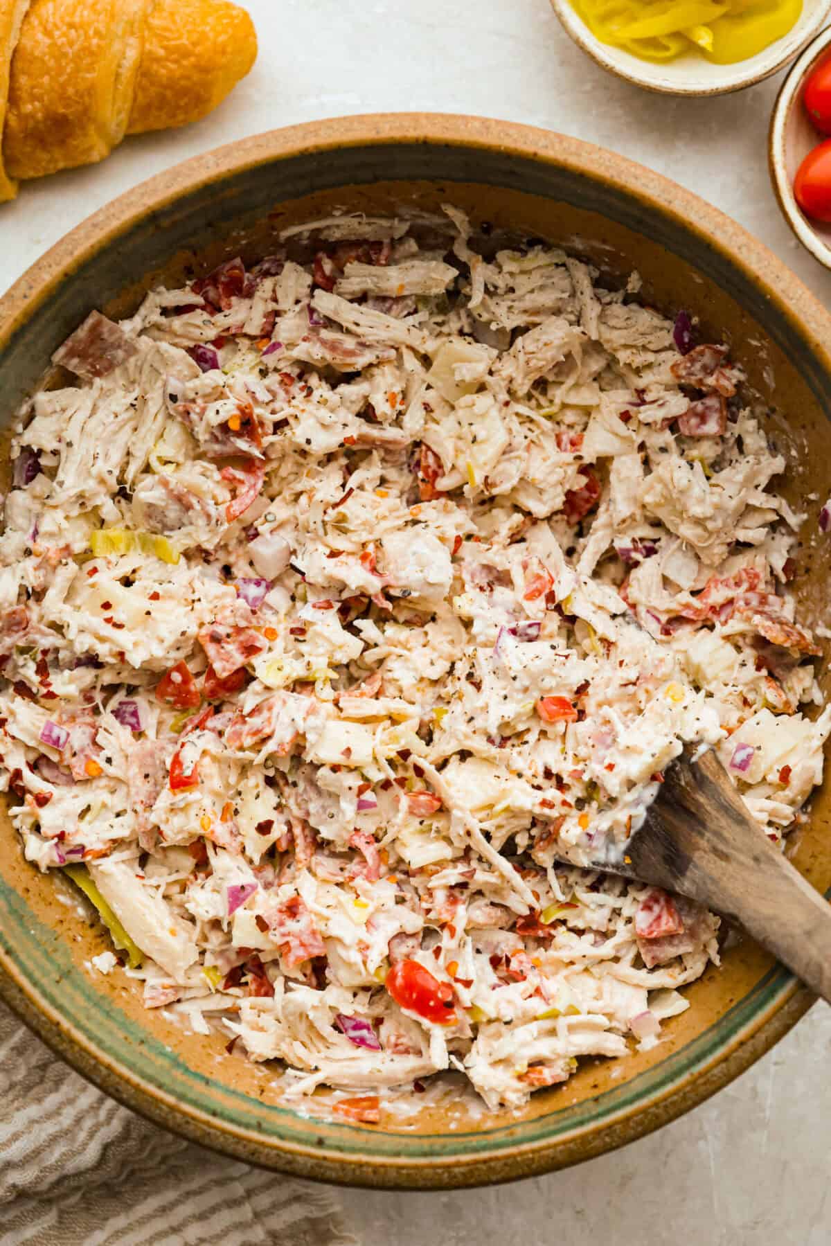 Overhead shot of grinder chicken salad in a large bowl. 