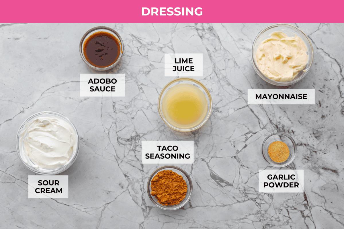 Overhead shot of labeled dressing ingredients. 