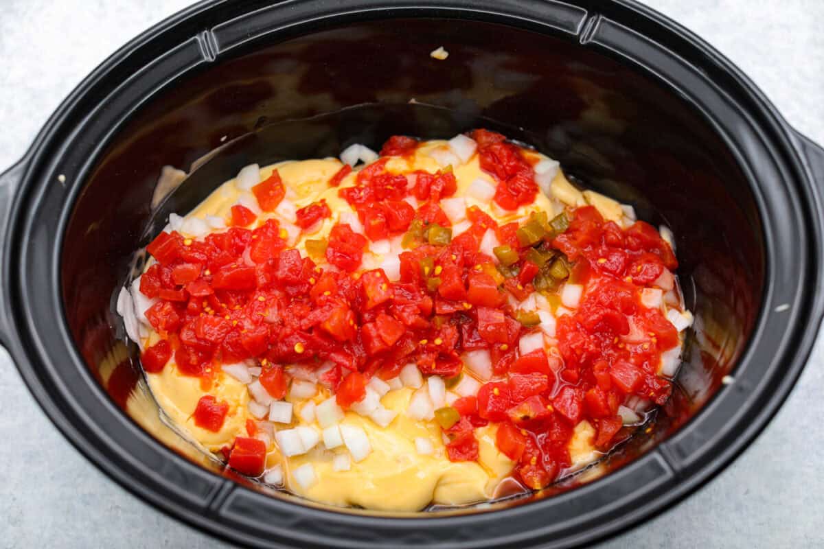 Sauce ingredients added to the crockpot. 