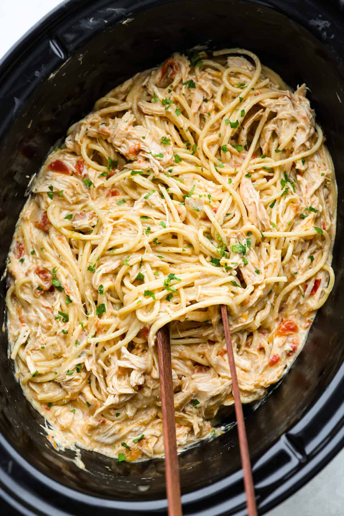 Overhead shot of crockpot chicken spaghetti. 