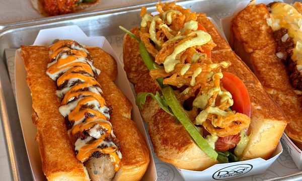 National Dog Day - Dog Haus August Restaurant Deals for College Move-in Season, Waffle Day, Football Days, and More!