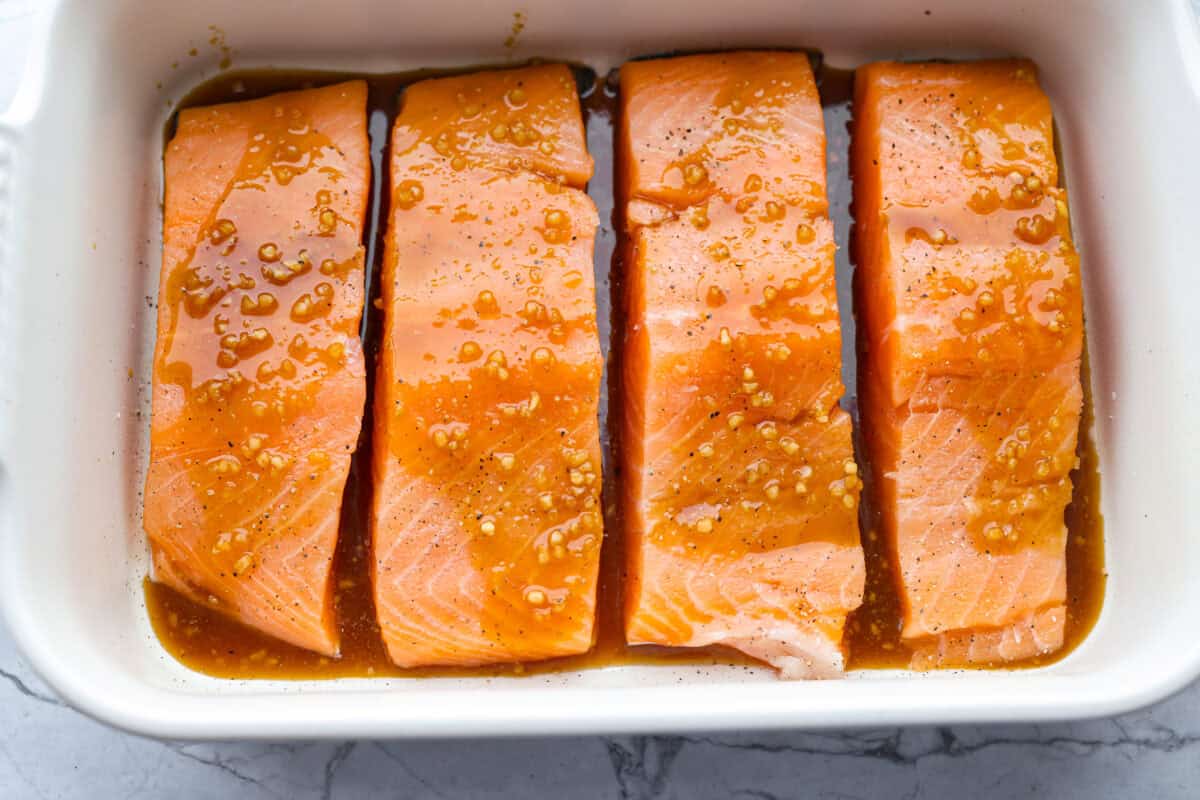 Sauce poured over the salmon ready to be cooked. 