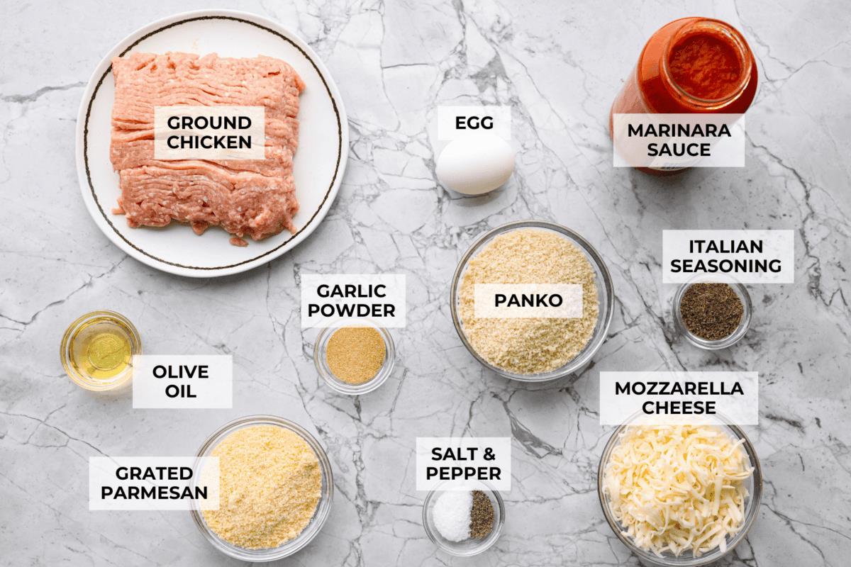 Overhead shot of labeled chicken parmesan meatballs ingredients. 