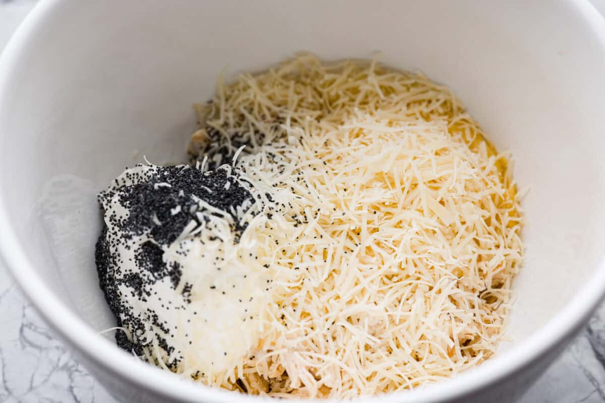 Casserole ingredients added to a mixing bowl. 