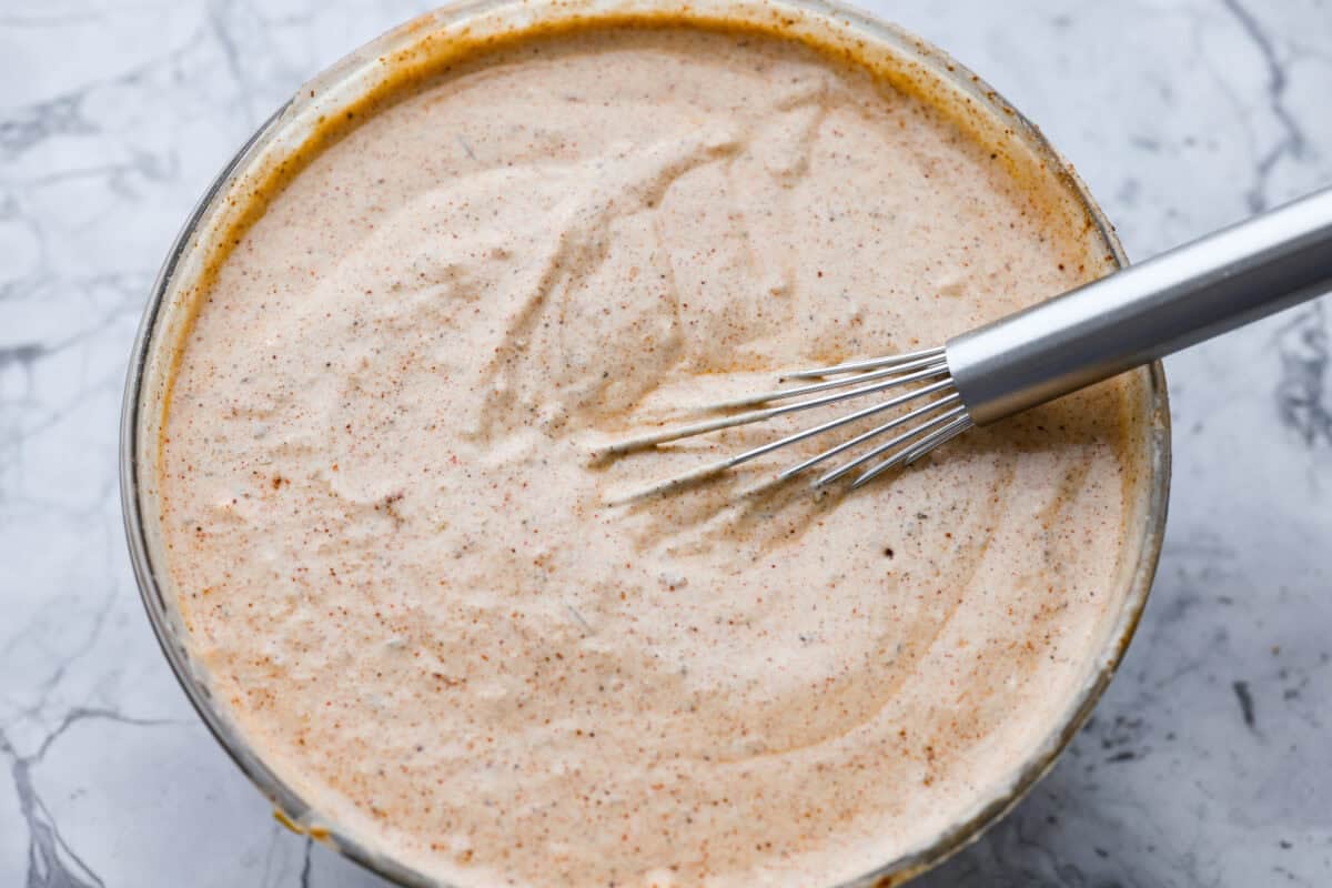 Sauce ingredients mixed together in a bowl.