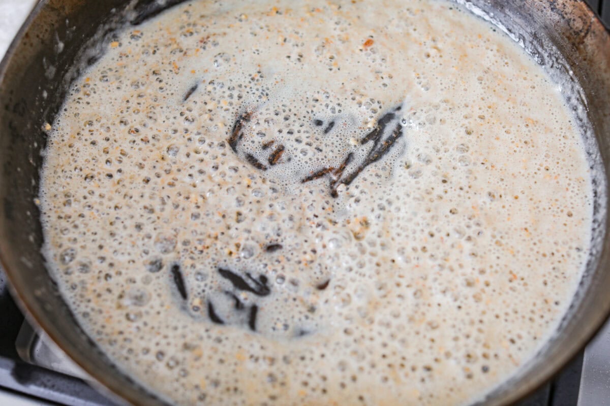 Garlic and flour added to the melted butter in a skillet. 