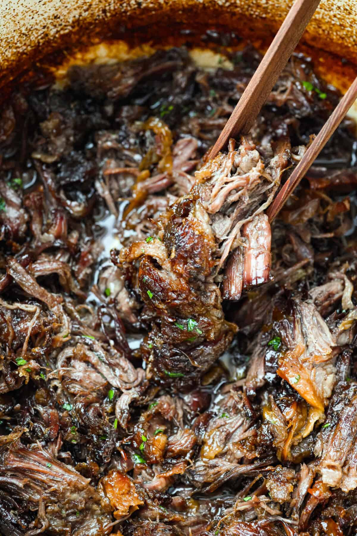 Close up of a scoop of caramelized chuck roast.