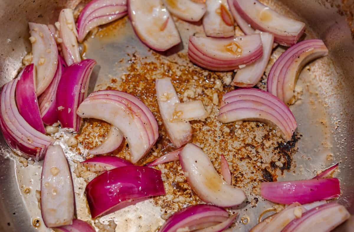 Garlic and onions sautéing in olive oil. 