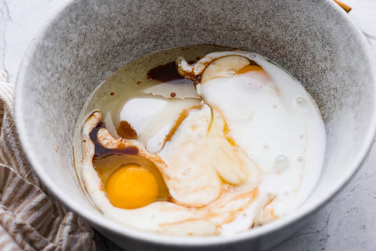 Wet ingredients added to a bowl.