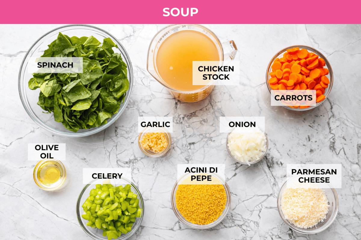 Overhead shot of labeled  Italian wedding soup ingredients. 