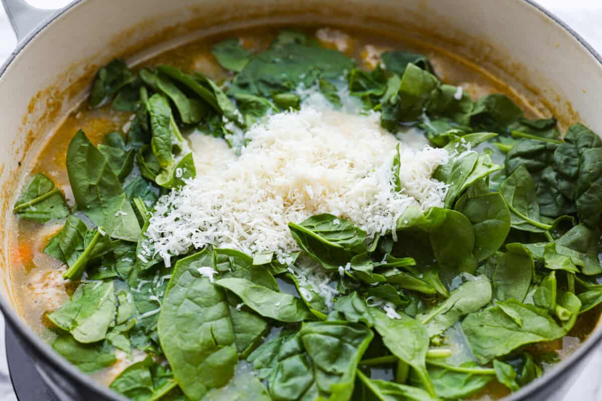 Spinach and parmesan cheese added to the soup at the end. 