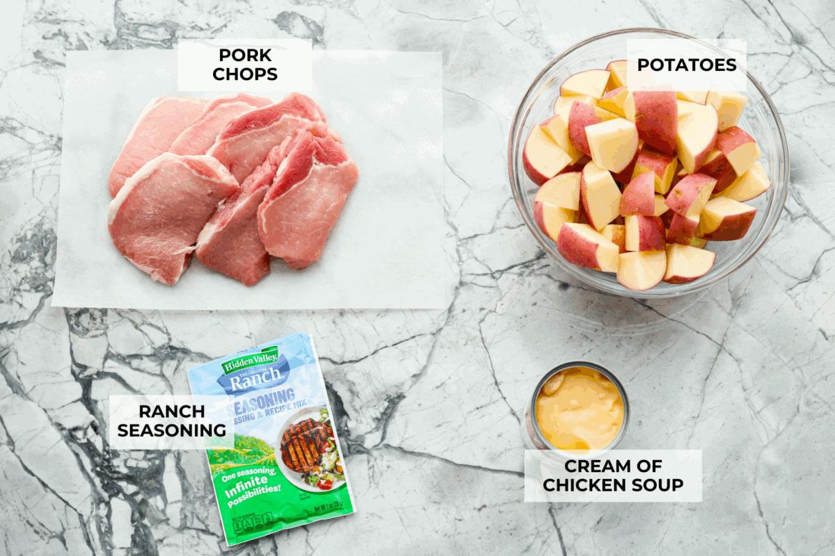 Overhead shot of labeled slow cooker ranch pork chops ingredients. 