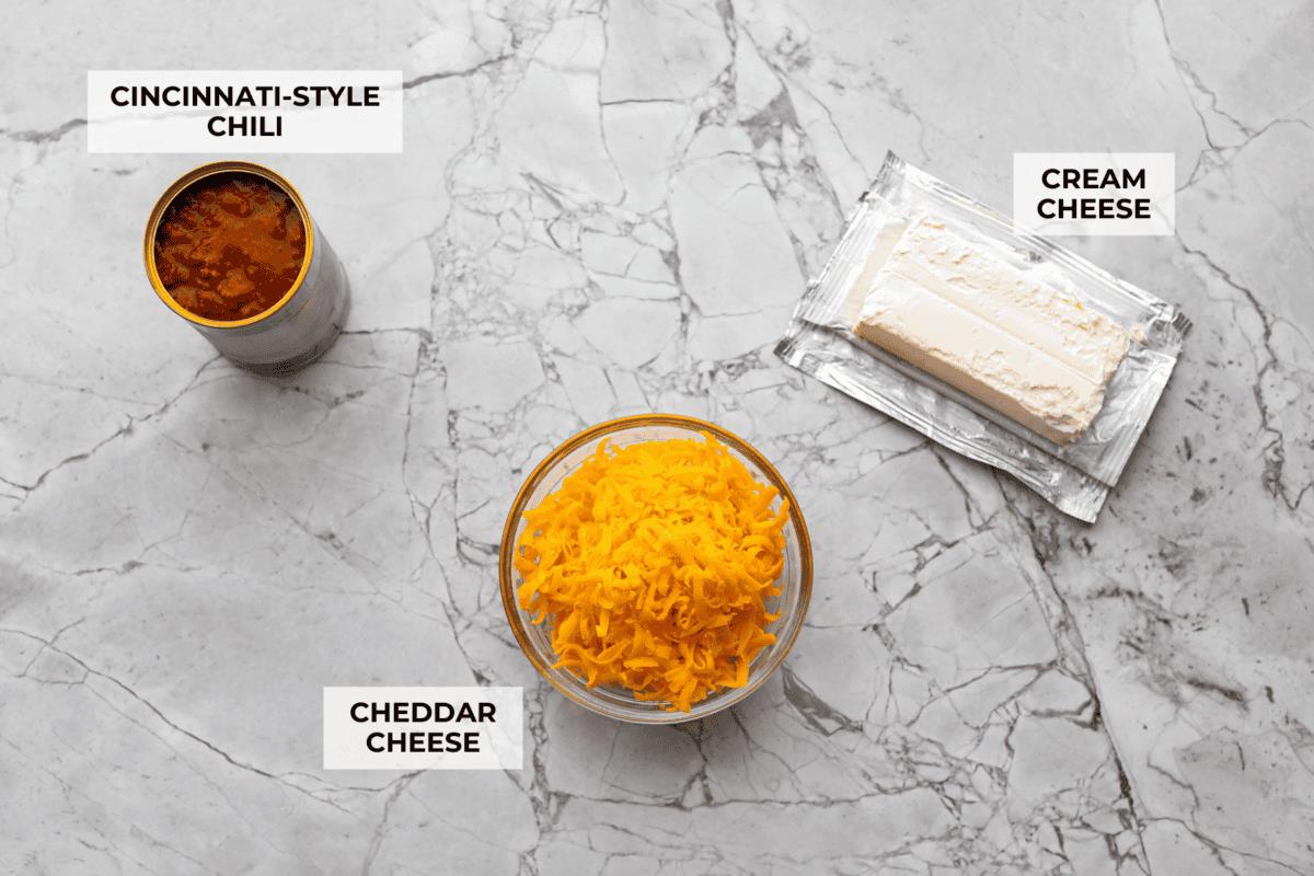 Overhead shot of labeled Cincinnati chili dip ingredients. 