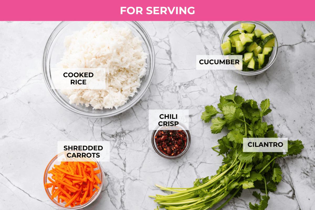 Overhead shot of labeled ingredients you serve with beef broth bowls.