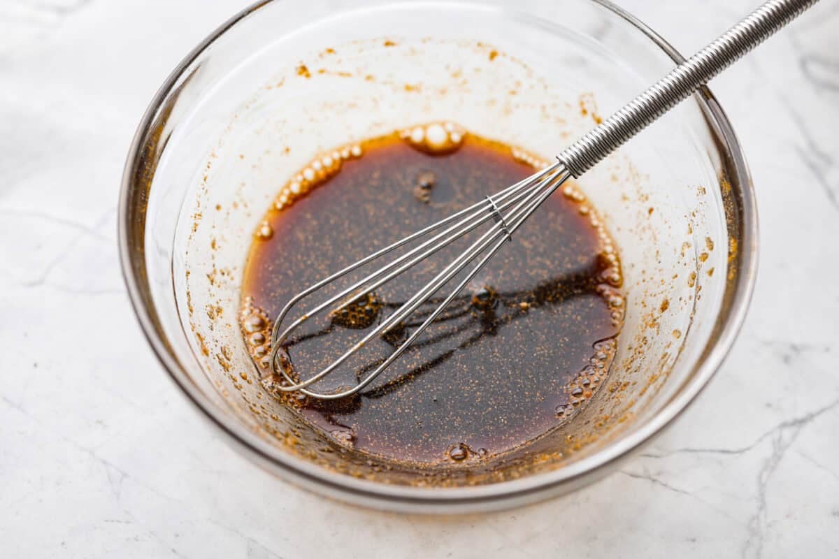 Sauce ingredients whisked together in a bowl. 