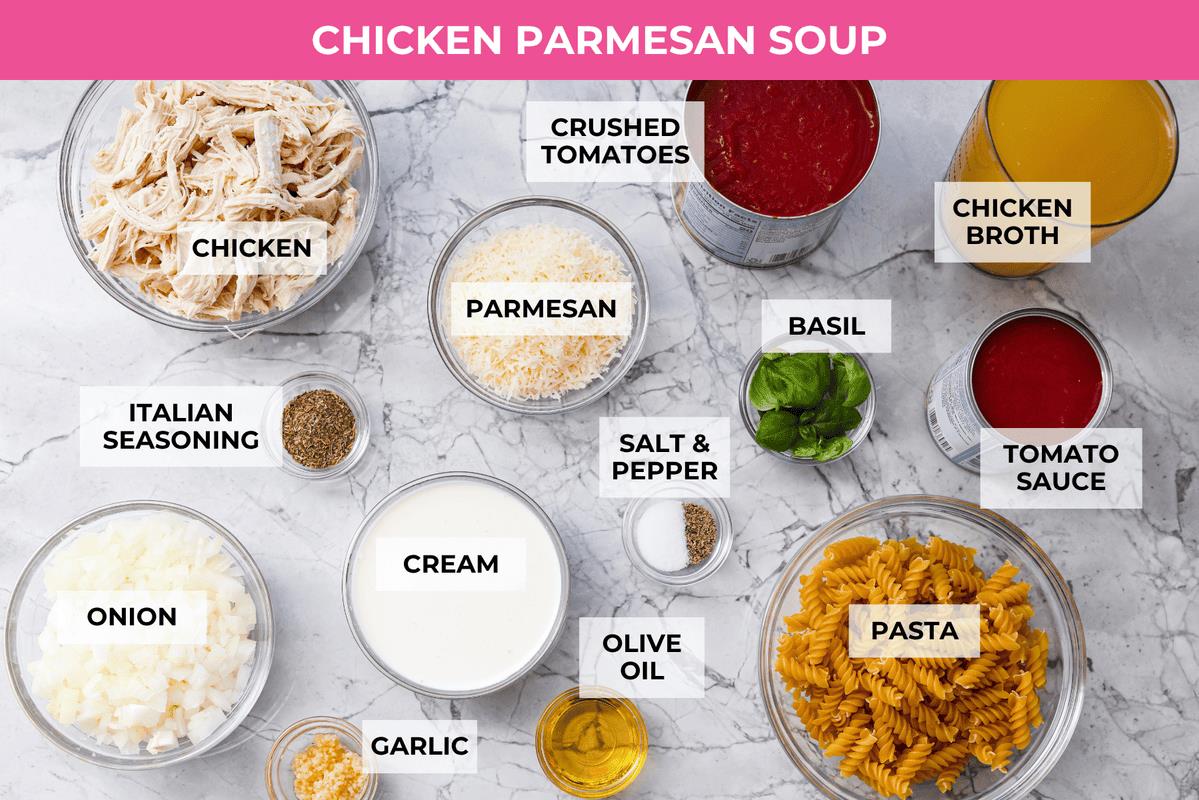 Overhead shot of labeled chicken parmesan soup ingredients. 
