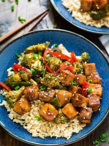 General Tso Tofu. A healthy, DELICIOUS version of everyone’s favorite takeout dish. Easy and made with everyday ingredients. Filled with fresh veggies and protein, in the most flavorful General Tso’s sauce. ONE PAN, vegan, and gluten free!